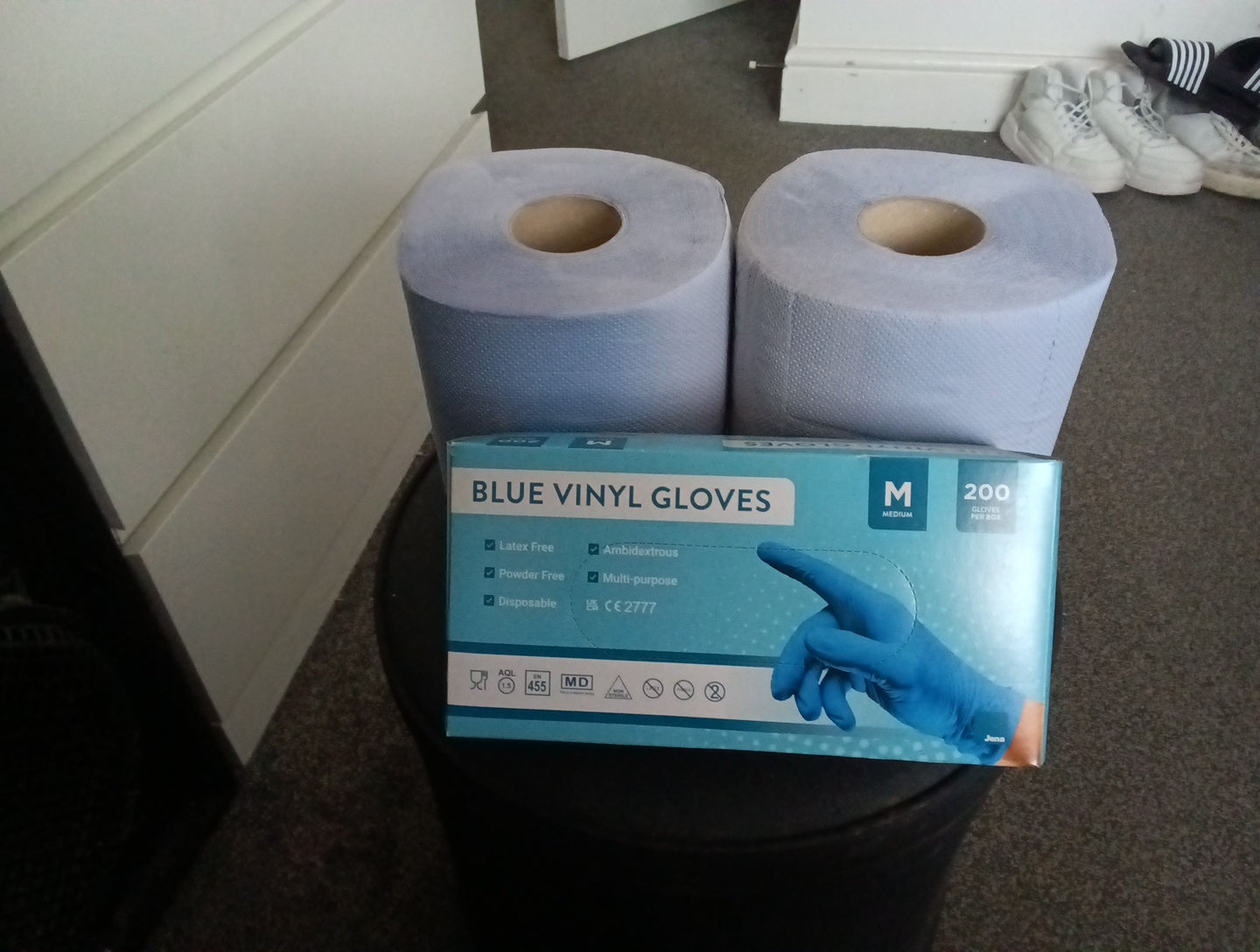 2 Blue rolls and pack of disposable glove